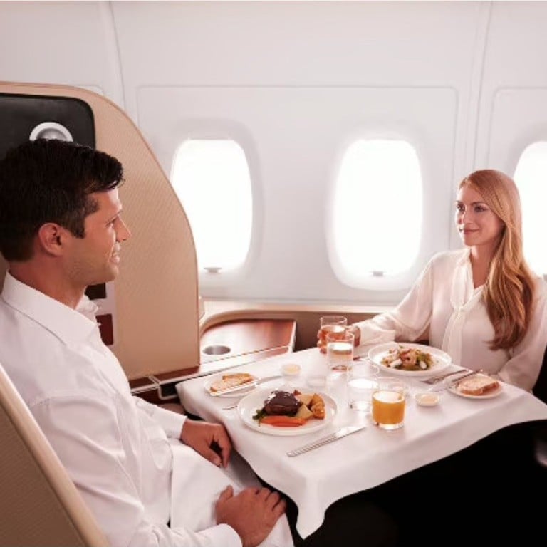 Airlines are showcasing their plush new first classes, with cabins even designed to seat two people in case travellers want to eat together. Photo: Qantas