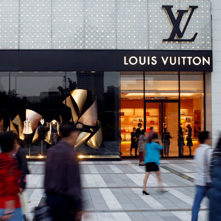 Why is China obsessed with luxury brands? Status-conscious buyers