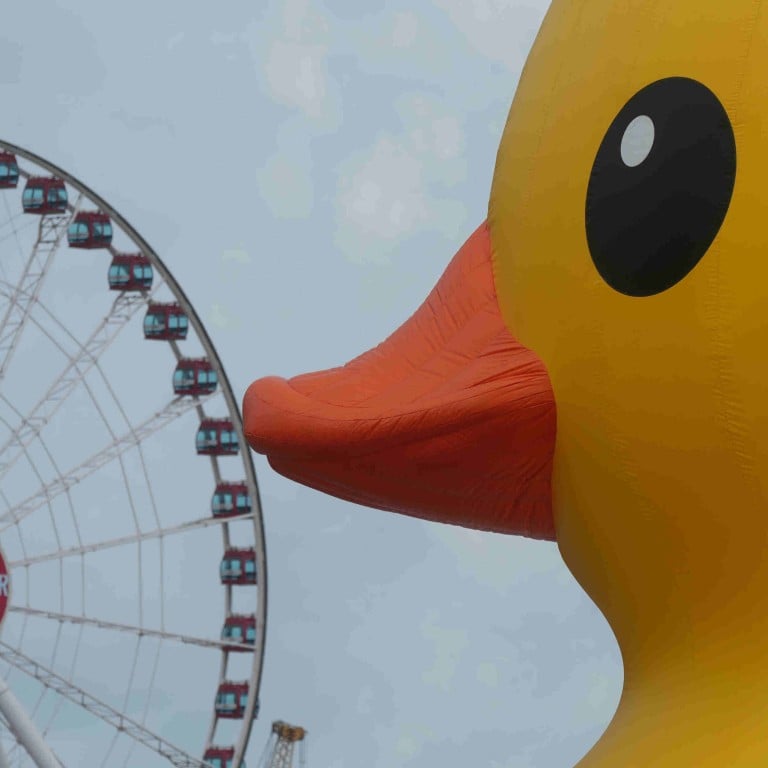 Hongkongers’ public imagination was awakened by the emergence of two giant rubber ducks, anchored at Victoria Harbour as the art installation Double Ducks by Florentijn Hofman. Photo: Sam Tsang