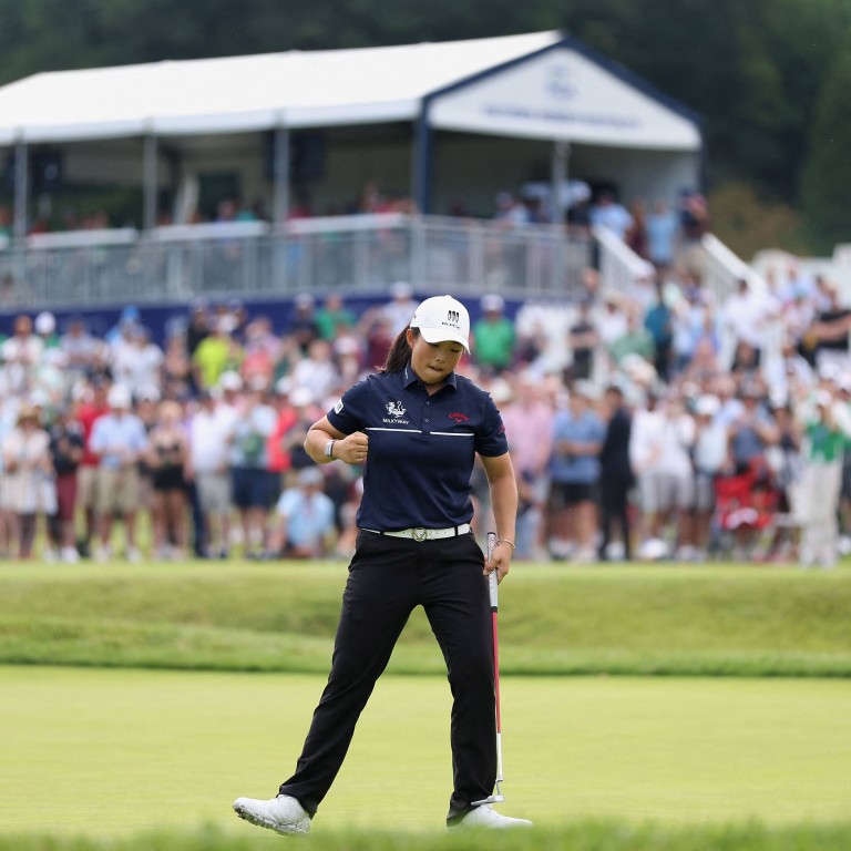 Yin Ruoning celebrates after holing her putt on 18 during the final round of the  KPMG Women’s PGA Championship. Photo: AFP