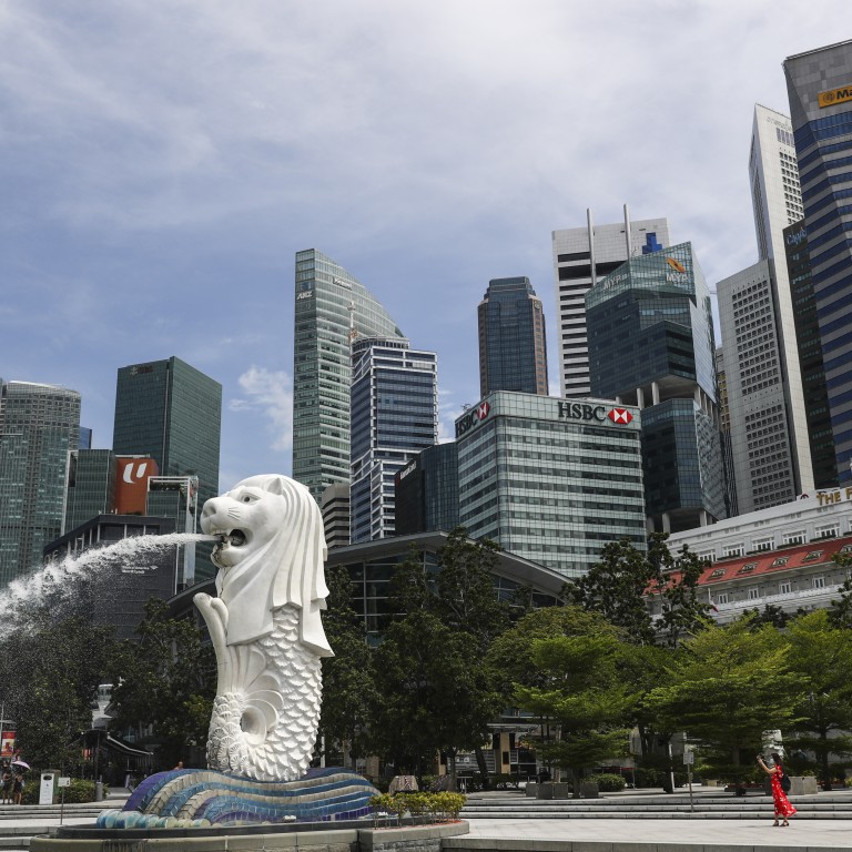 Kang Lihong said she had “no choice” as a mother but to overstay in Singapore to support her son’s education. Photo: AP