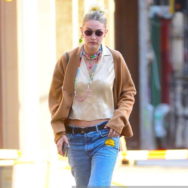 Supermodel Gigi Hadid shows herself at home in the Big Apple in cosy noughties outfits updated with kooky and colourful accessories. Photo: GC Images