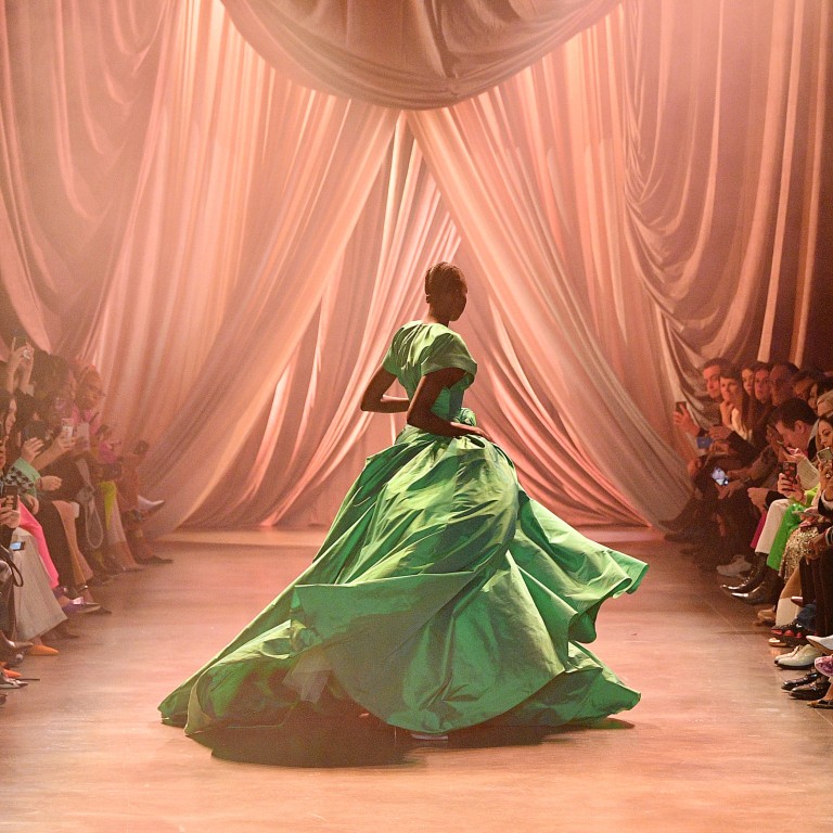 In this image released on June 15th, models walk the runway during