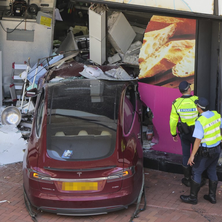 Tesla crashes into Hong Kong department store, injuring driver and ...