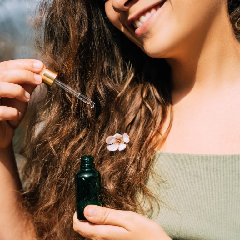 Rosemary oil is a natural solution for at-home haircare. Photo: Getty Images
