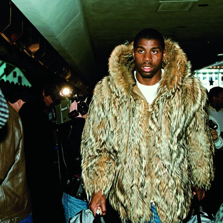 As well as a top NBA player, Earvin “Magic” Johnson is considered a style icon, pictured here with typical swagger arriving for the Los Angeles Lakers’ game at the 1988 NBA All-Star Game. Photo: Getty