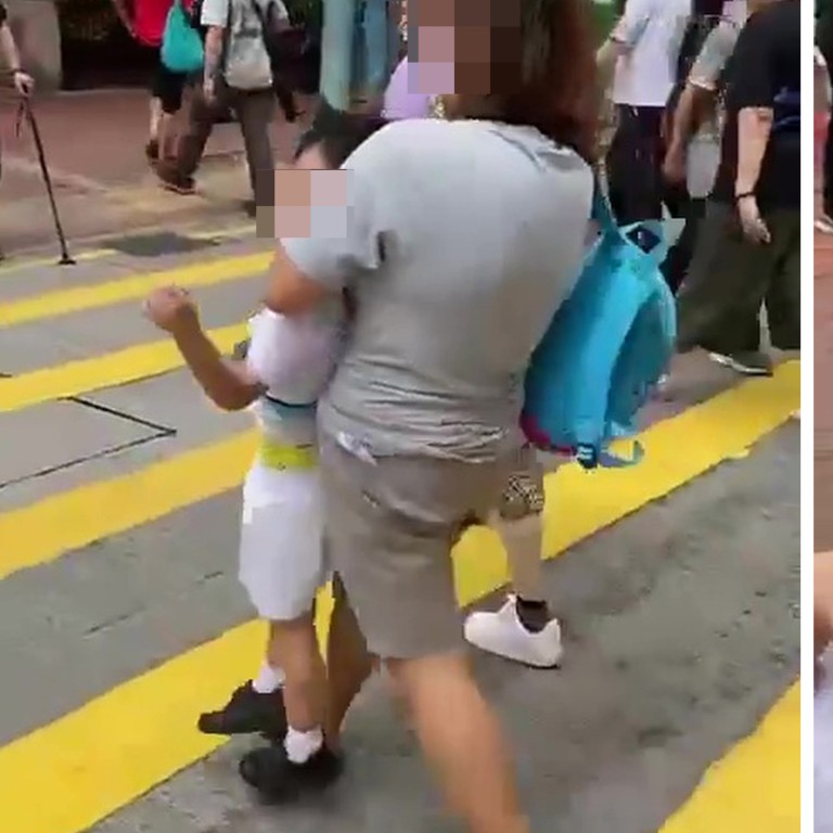 Video of Hong Kong preschool pupil lifted off feet by neck and carried