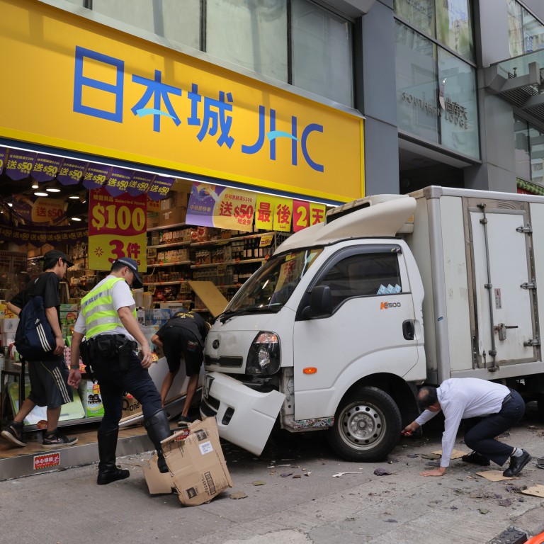 4 Hurt In Hong Kong After Truck Slams Into Shop, Following Collision ...