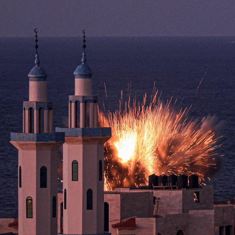 A fireball erupts from an Israeli air strike in Gaza City. Photo: AFP