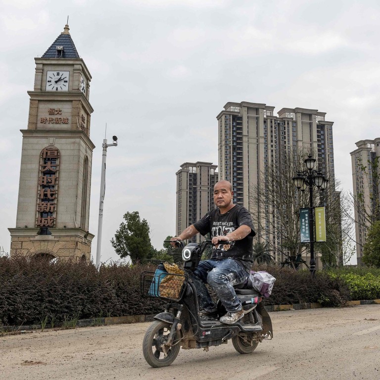 China’s economic ‘risks will intensify’ in 2024, with EVs, property ...
