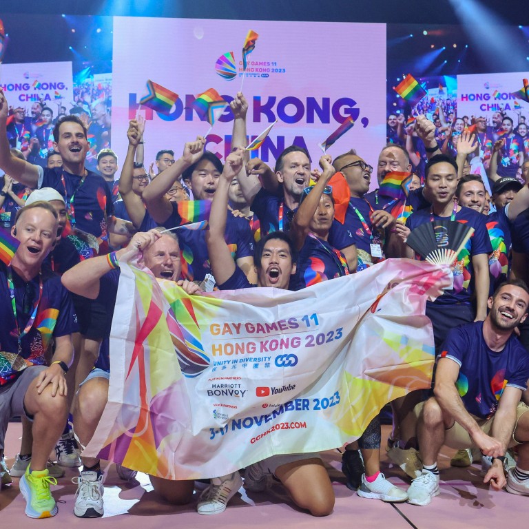 hong kong hosting gay games shows openness, mainland chinese professor says, but fellow basic law committee member urges city to uphold traditional values
