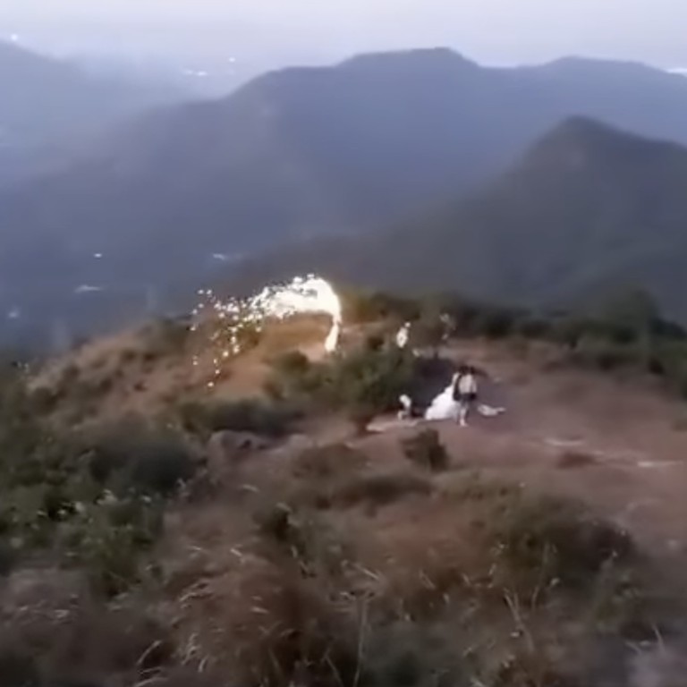 hong kong authorities look into allegations fireworks illegally set off during wedding photo shoot on mountain, amid concern over blaze risk