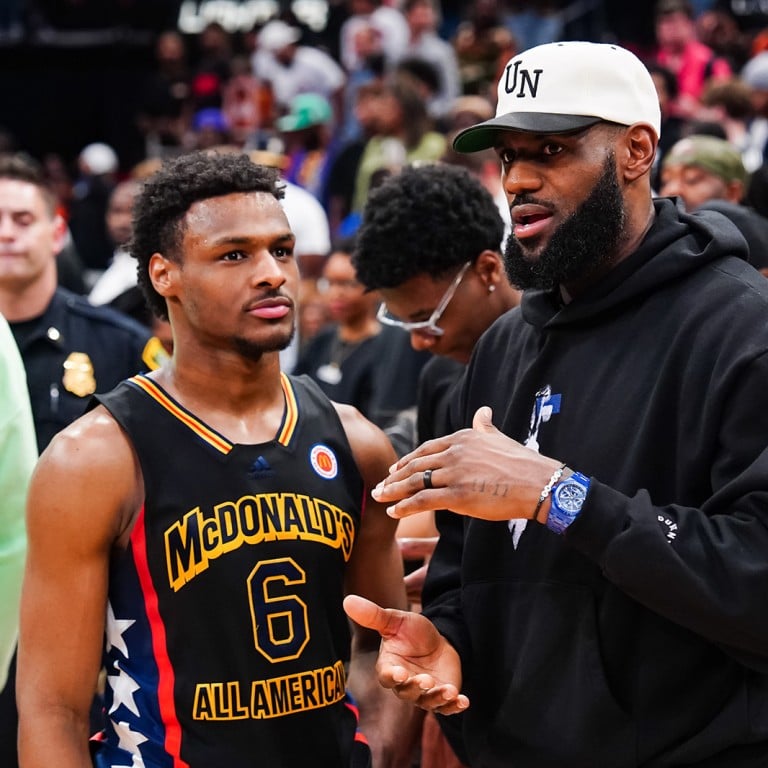 Bronny James talks to LeBron James of the Los Angeles Lakers after the 2023 McDonalds High School Boys All-American Game at Toyota Center on March 28, in Houston, Texas. Photo: TNS