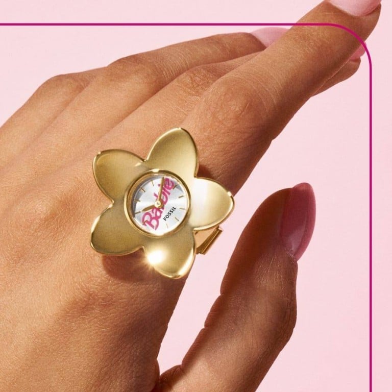 The Barbie x Fossil ring watch sports a 1990s-era Barbie logo on its dial. Photo: Handout