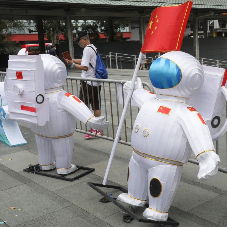 Chinese astronaut decorations are seen outside Wong Tai Sin Temple in Hong Kong on September 6, 2022. Photo: Yik Yeung-man
