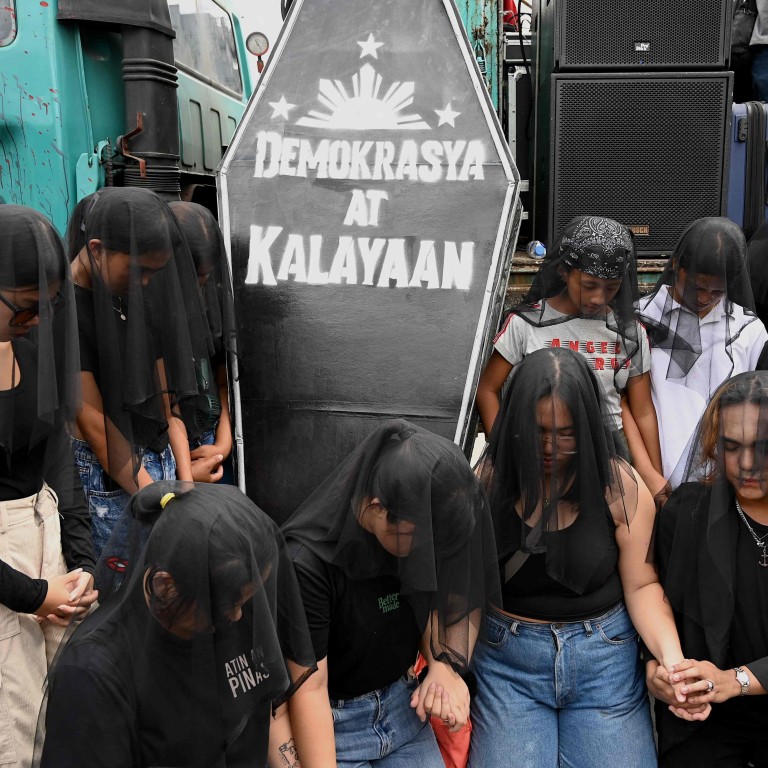 Philippine protesters say ‘never again’ on anniversary of anti-Marcos ...