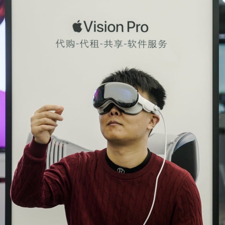 A person uses a Vision Pro headset in a store in Beijing, China, 24 February 2024. Photo: EPA-EFE