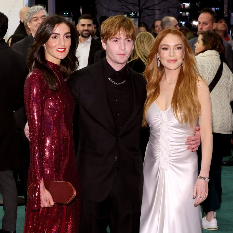 Lindsay Lohan with her siblings Aliana Lohan and Dakota Lohan at the premiere of Irish Wish. Photo: Getty Images