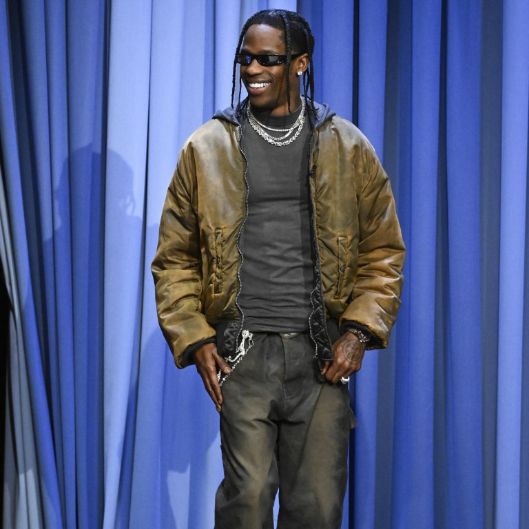Rapper Travis Scott appeared on The Tonight Show Starring Jimmy Fallon in December in trademark relaxed style with a distressed bomber jacket topped with necklace bling. Photo: Getty Images
