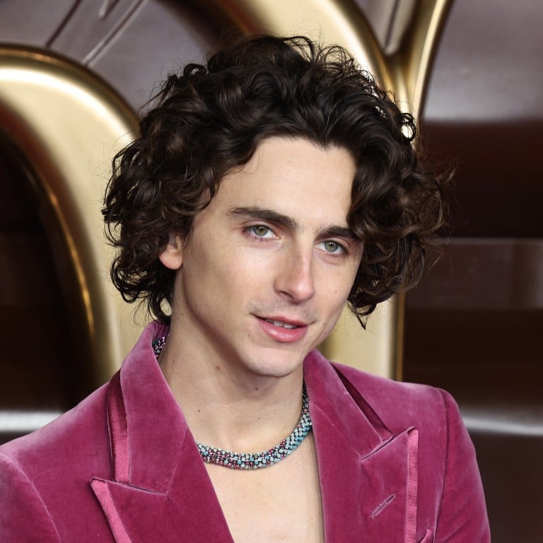 Timothée Chalamet wears candy-like Cartier jewellery at the world premiere for Wonka in London, in November. Photo: FilmMagic