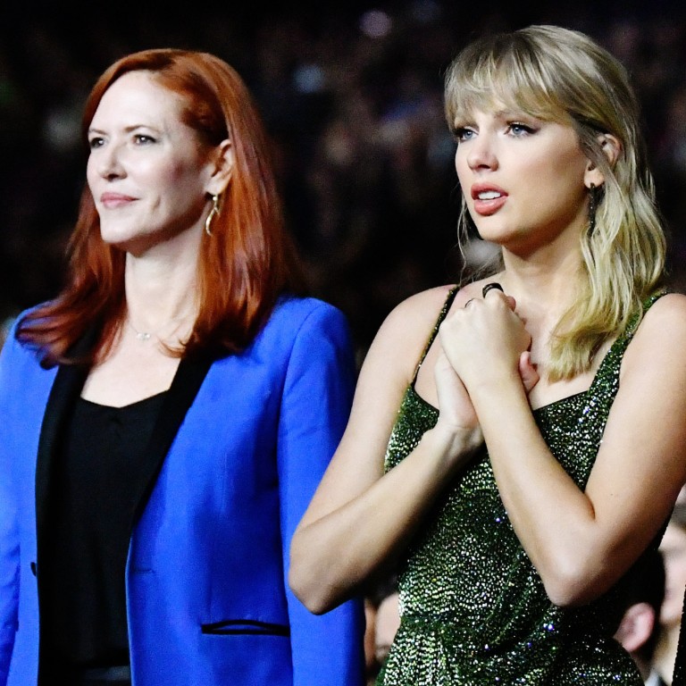 By her side, no matter what: publicist Tree Paine and Taylor Swift. Photo: Getty Images for DCP