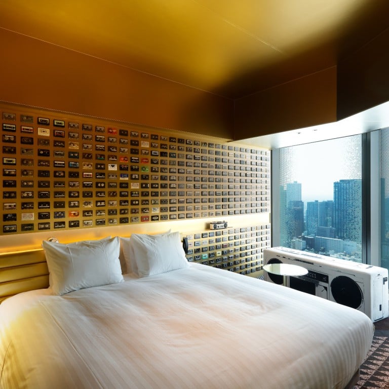 A music-themed room at Hotel Groove in Tokyo features cassette tapes on the wall. It was designed in collaboration with artist Yoshiaki Kaihatsu. Photo: Handout