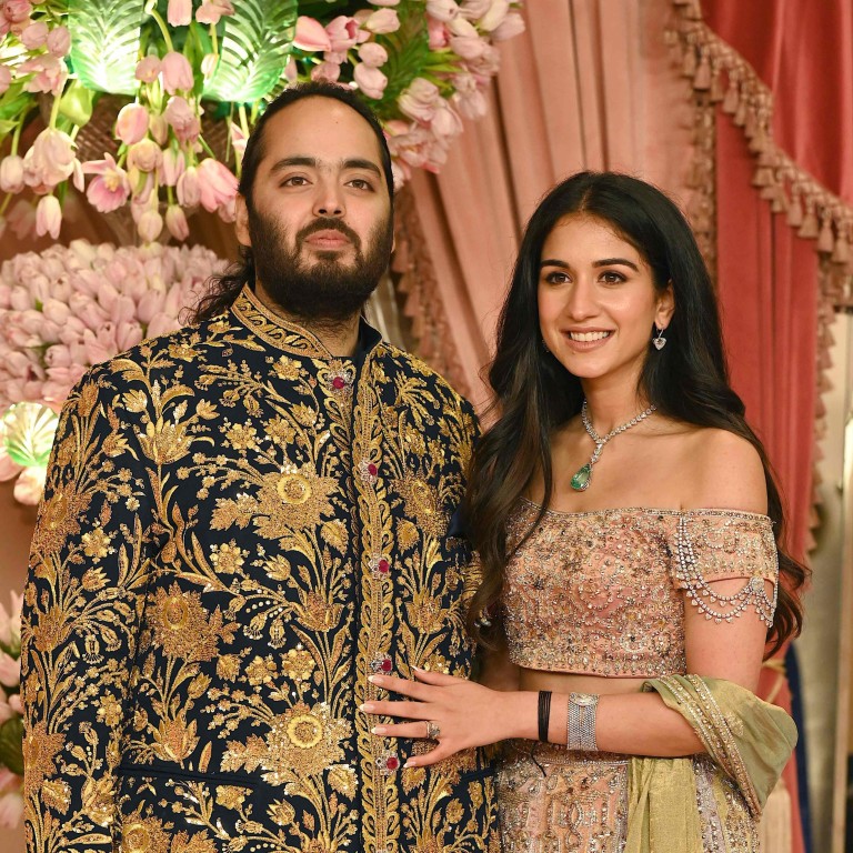 Anant Ambani, son of billionaire tycoon Mukesh Ambani, with his fiancée Radhika Merchant. Photo: AFP