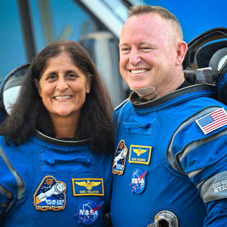 Nasa astronauts Barry Wilmore and Sunita Williams pose before boarding their Boeing Starliner spacecraft on June 5. Photo: AFP