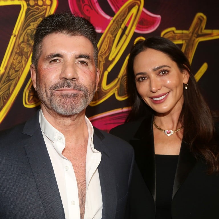 Simon Cowell and Lauren Silverman pose at the opening night of the musical & Juliet on Broadway at The Stephen Sondheim Theatre in November 2022, in New York. Photo: Getty Images