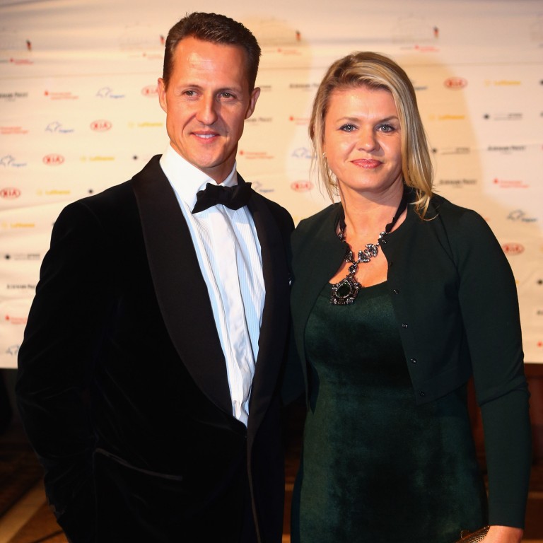 Ex-Formula One driver Michael Schumacher and his wife Corinna pose during the 31. Sportpresseball at Alte Oper in 2012, in Frankfurt am Main, Germany. Photo: Getty Images