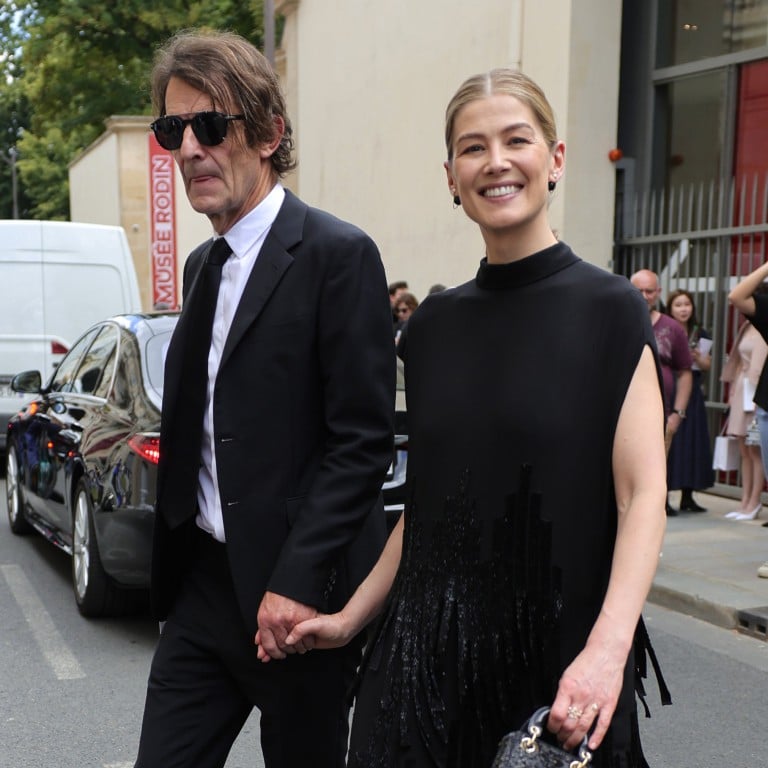 Robie Uniacke and Rosamund Pike occasionally step out at fashion events together. Photo: Getty Images