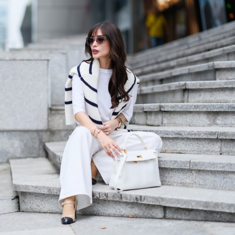 Heart Evangelista wears a dark navy blue and white wool knit pullover in the classic Breton striped style. Photo: Getty Images