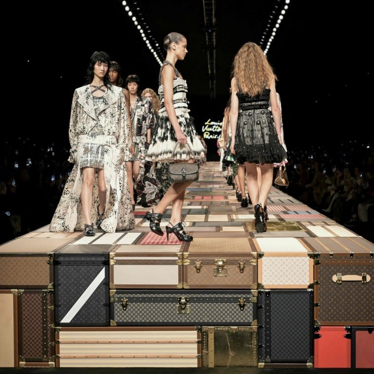 Models walked on a raised runway made of Louis Vuitton trunks at the label’s spring/summer 2025 show during Paris Fashion Week. Photo: AFP