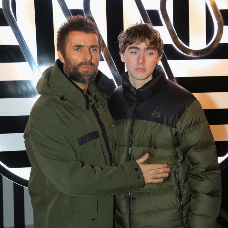 Matching eyebrows: Oasis singer Liam Gallagher with his son, Gene Gallagher. Photo: Getty Images