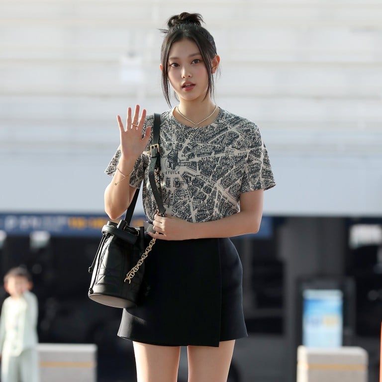 Haerin of K-pop girl group NewJeans at Incheon Airport in April, rocking a monochrome look with her Dior bag. Photo: WireImage