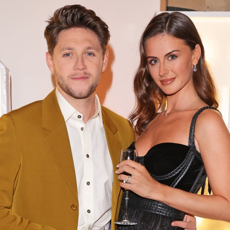 Niall Horan and Amelia “Mia” Woolley at the Horan & Rose Show in 2021. Photo: Getty Images for Modest! Golf