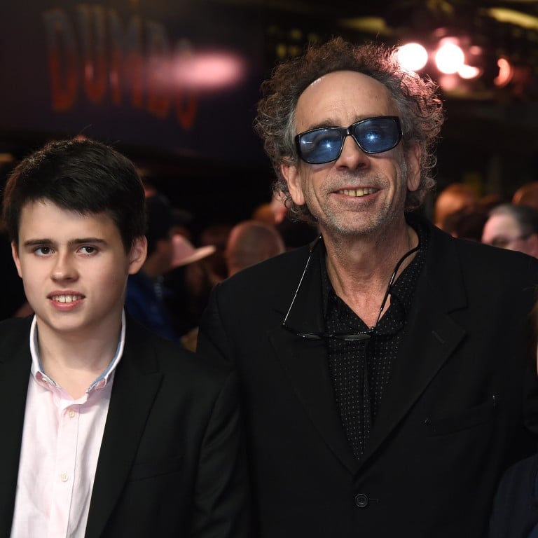 Director Tim Burton, with children Billy and Nell in 2019. Photo: Getty Images