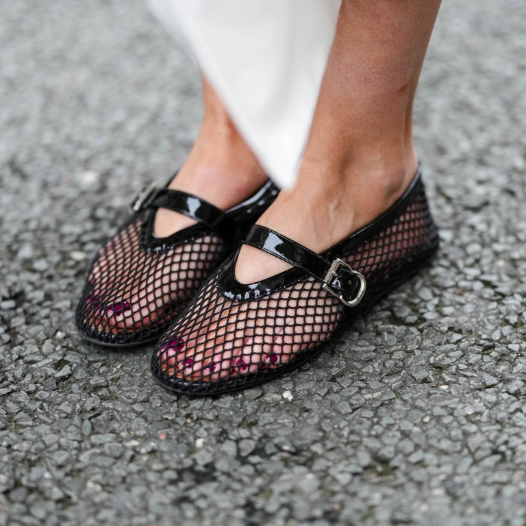 Virginie Conte wears black mesh Alaïa ballerina shoes during a street style fashion photo session, in October, in Paris, France. Photo: Getty Images