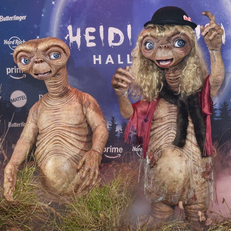 Heidi Klum, right, and Tom Kaulitz attend the supermodel’s annual Halloween party both dressed as E.T. at the Hard Rock Hotel in New York. Photo: AP