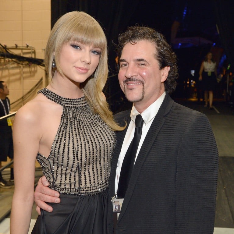 Singer Taylor Swift and Big Machine Records founder Scott Borchetta at the 48th Annual Academy of Country Music Awards at the MGM Grand Garden Arena in 2013, in Las Vegas, Nevada. Photo: Getty Images