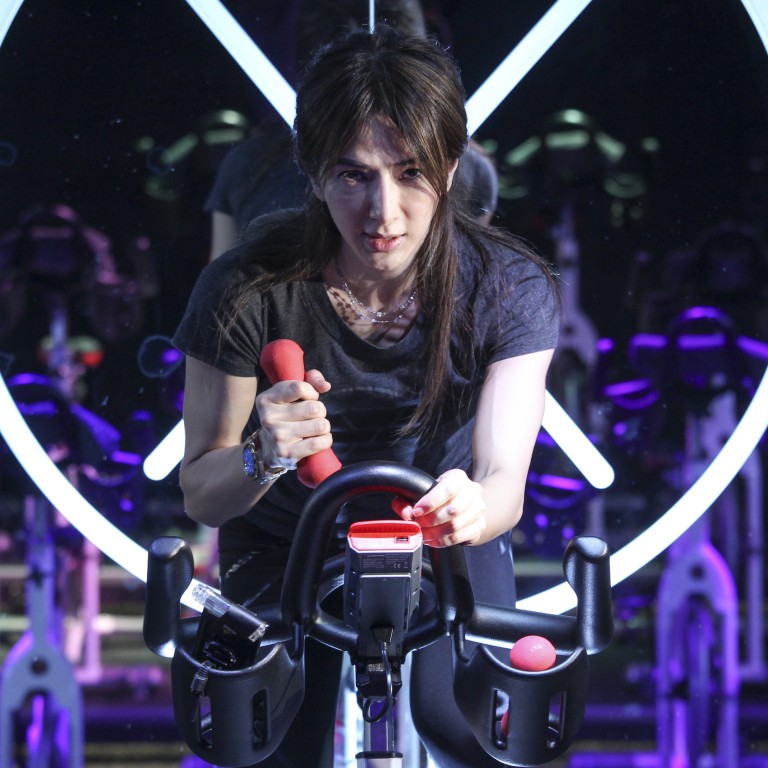 Founder Belinda Koo poses for a picture at XYZ cycling studio in Central, Hong Kong. Photo: Dickson Lee