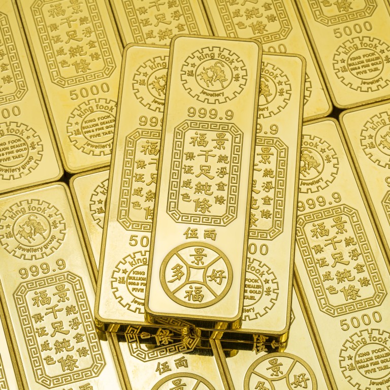 Hong Kong jeweller King Fook Jewellery is giving away 75 taels of gold bars for its 75th anniversary... in a lucky draw. Photo: Handout