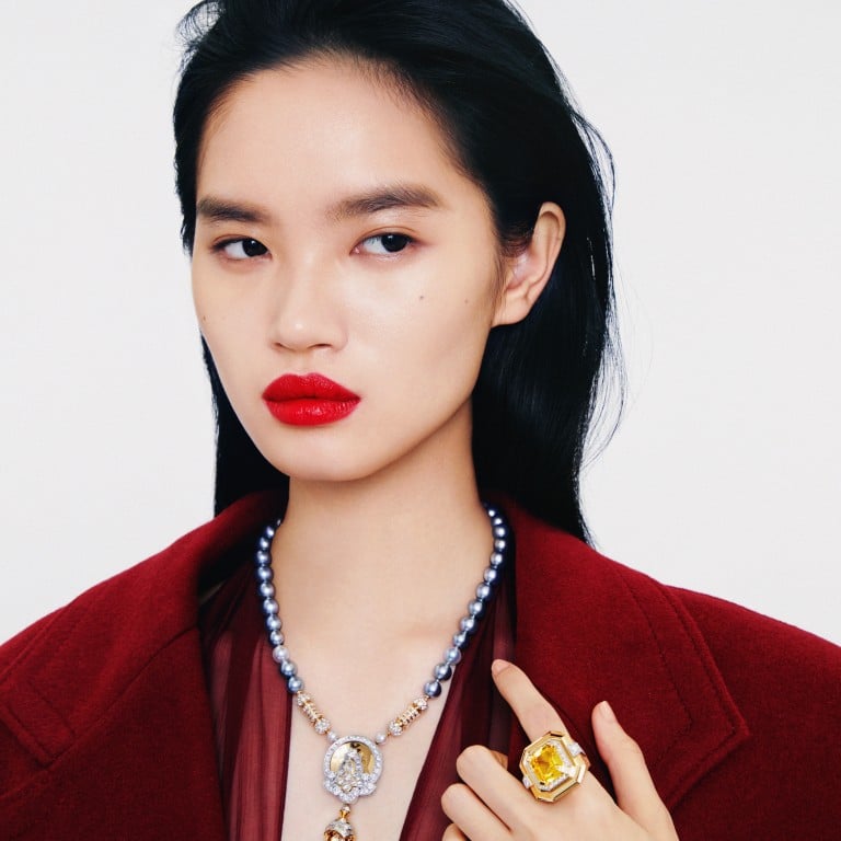 Van Cleef & Arpels: necklace, ring; Ferragamo: coat, dress. Photo: Olivia Tsang