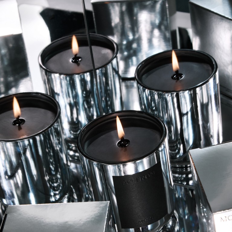 Scented candles from Loewe, La DoubleJ, Diptyque and Aotrom (pictured) bring soft light and the smell of Italian flowers, a Scottish highland or a pine forest. Photos: Handout