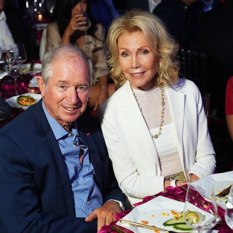 The daughter of a NYC firefighter, Christine Schwarzman is not your typical Wall Street wife ... so what do we know about the life of Stephen Schwarzman’s (left) partner? Photo: Getty Images