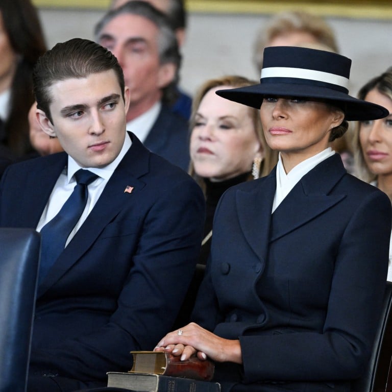 Barron Trump and First Lady Melania Trump listen as US President Donald Trump delivers remarks after being sworn in as the 47th President in the US Capitol Rotunda in Washington, DC, on January 20, 2025. SAUL LOEB/Pool via REUTERS