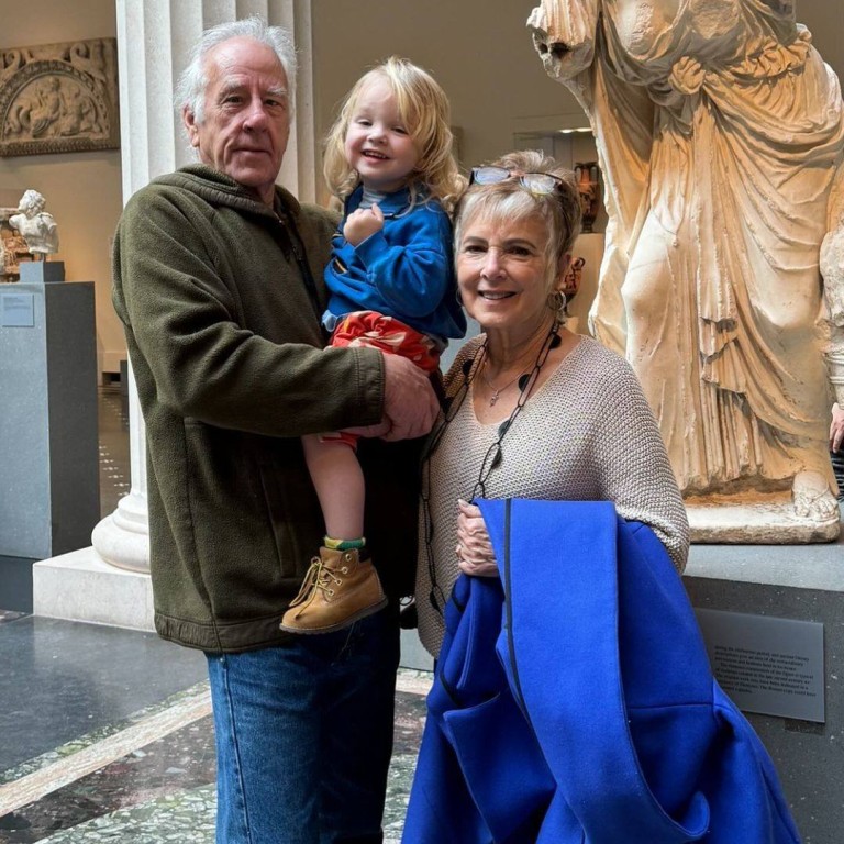 Emily Ratajkowski’s parents, John Ratajkowski and Kathleen Balgley, with their grandson Sly. Photo: @johnratajkowski/Instagram