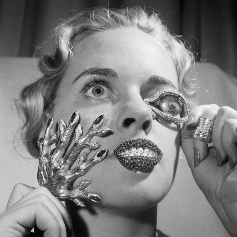 Madelle Hegeler shows off weirdly striking jewellery by Elsa Schiaparelli and Salvador Dalí in New York, in 1959. Photo: Getty Images