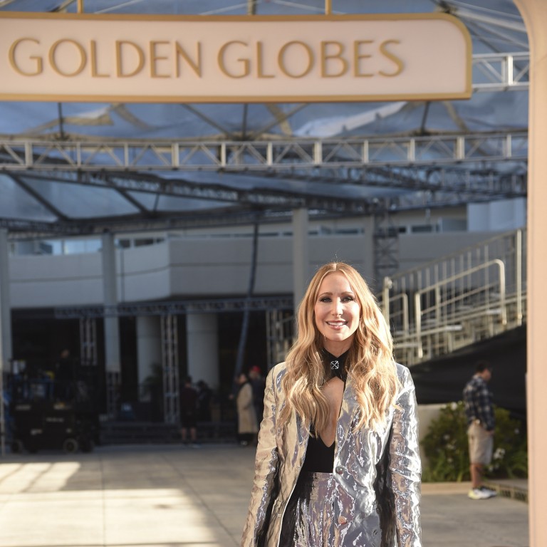 Nikki Glaser dazzled in an Off-White silver suit on the 2025 Golden Globes red carpet in January as she aced her debut appearance as host of one of the year’s biggest awards nights. Photo: Invision/AP
