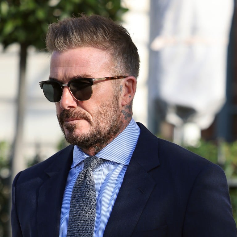 Suited, booted and tied to perfection, David Beckham steps out in style during Paris Fashion Week in March. Photo: GC Images
